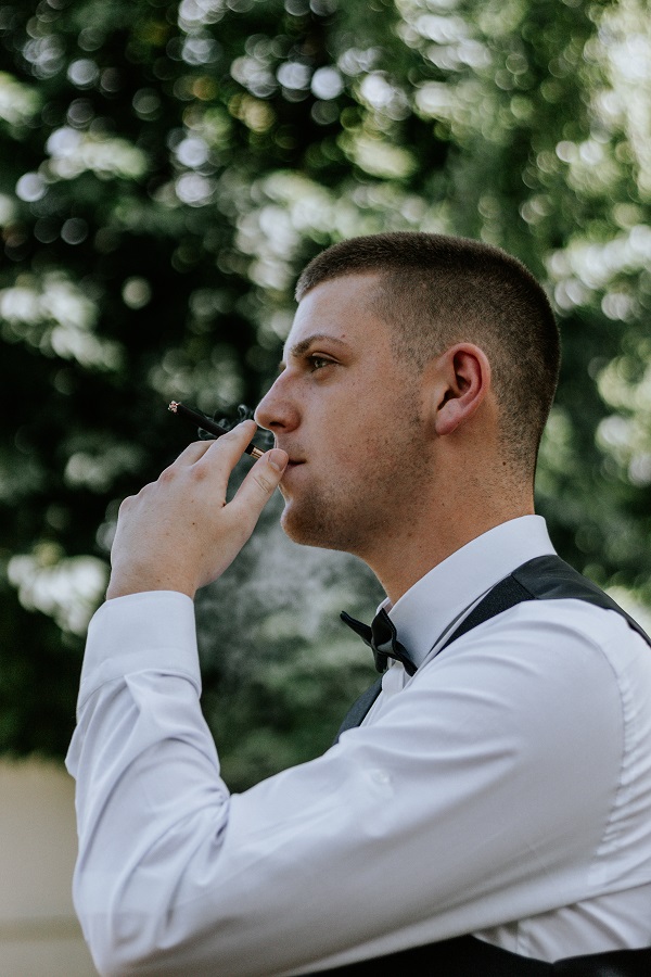 Boy with cigarette.